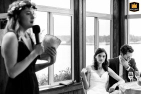 At the Linekin Bay Resort in Boothbay Harbor, Maine, the groom tears up during the maid of honor speech delivered by his new sister-in-law.